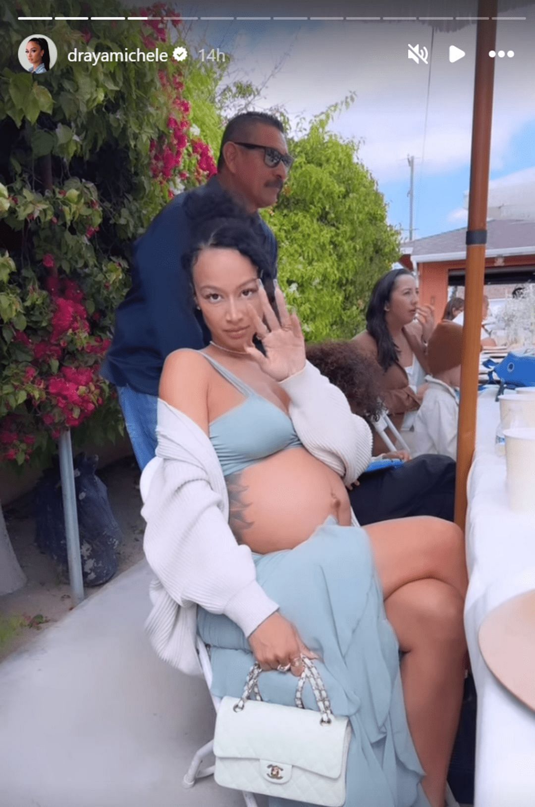 @drayamichele showing her Chanel Bag